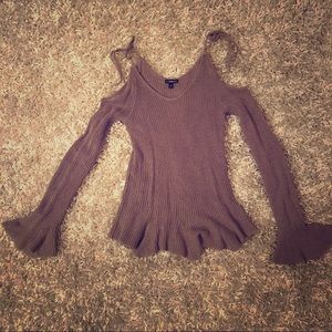 Express bell-sleeve with tie shoulder detail.